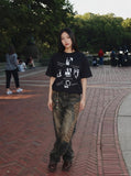 DAXUEN Black short-sleeved graphic t-shirt — model photo