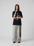 DAXUEN Black short-sleeved graphic t-shirt — model photo