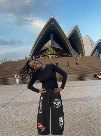 DAXUEN Graphic print wide leg sweatpants in black and white — model photo