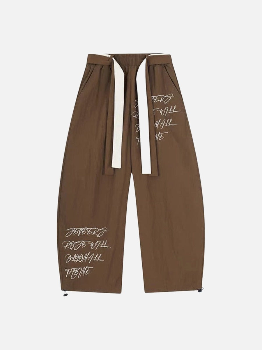 DAXUEN Graphic wide-leg trousers in black and mocha