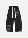 DAXUEN Graphic wide-leg trousers in black and mocha
