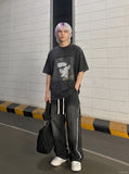 DAXUEN washed black oversized grayscale portrait graphic t-shirt — model photo
