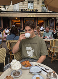 DAXUEN washed black oversized grayscale portrait graphic t-shirt — model photo