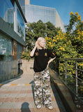 DAXUEN grey-brown camouflage wide-leg casual pants — model photo