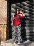 DAXUEN grey crackle wide-leg trousers — model photo