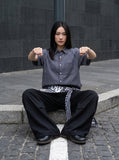 DAXUEN Loose-fitting short sleeve button-up shirt with grid pattern — model photo