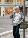 DAXUEN Oversized short-sleeved grid pattern rabbit graphic t-shirt — model photo