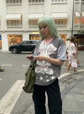 DAXUEN Oversized short-sleeved grid pattern rabbit graphic t-shirt — model photo