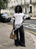 DAXUEN Short-sleeved loose-fitting mesh jersey t-shirt — model photo