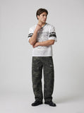 DAXUEN Short-sleeved loose-fitting mesh jersey t-shirt — model photo
