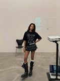 DAXUEN Black short-sleeved t-shirt with graphic text — model photo