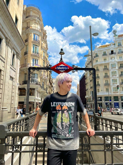 DAXUEN Faded wash crew neck t-shirt with graphic print — model photo