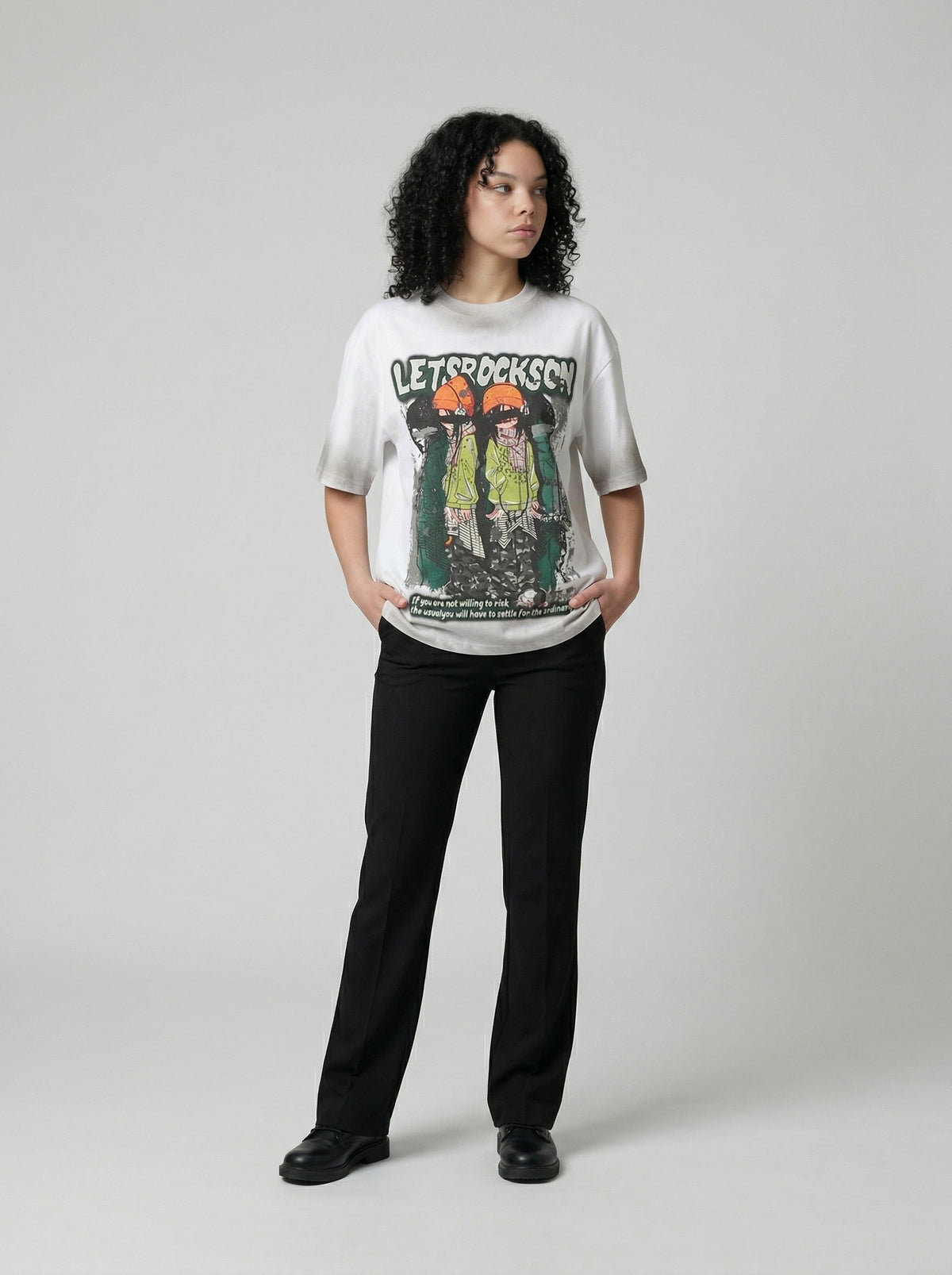 DAXUEN Faded wash crew neck t-shirt with graphic print — model photo