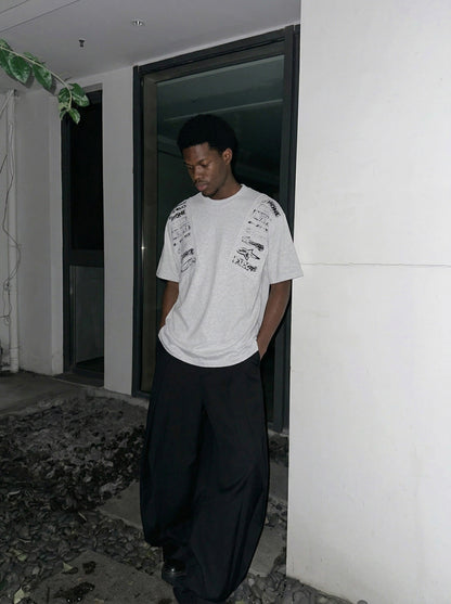 DAXUEN Short-sleeved crew neck T-shirt with grunge graphics — model photo