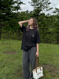 DAXUEN Oversized short-sleeved t-shirt with grunge print — model photo