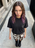 DAXUEN Oversized short-sleeved t-shirt with grunge print — model photo