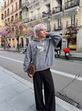DAXUEN muted blue oversized hand-drawn graphic hooded sweatshirt — model photo