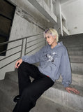 DAXUEN muted blue oversized hand-drawn graphic hooded sweatshirt — model photo