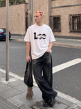 DAXUEN solid colour oversized hands-graphic t-shirt — model photo