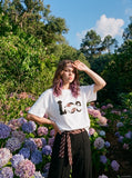DAXUEN solid colour oversized hands-graphic t-shirt — model photo