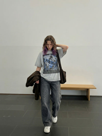 DAXUEN Graphic t-shirt featuring biker illustration and distressed text — model photo