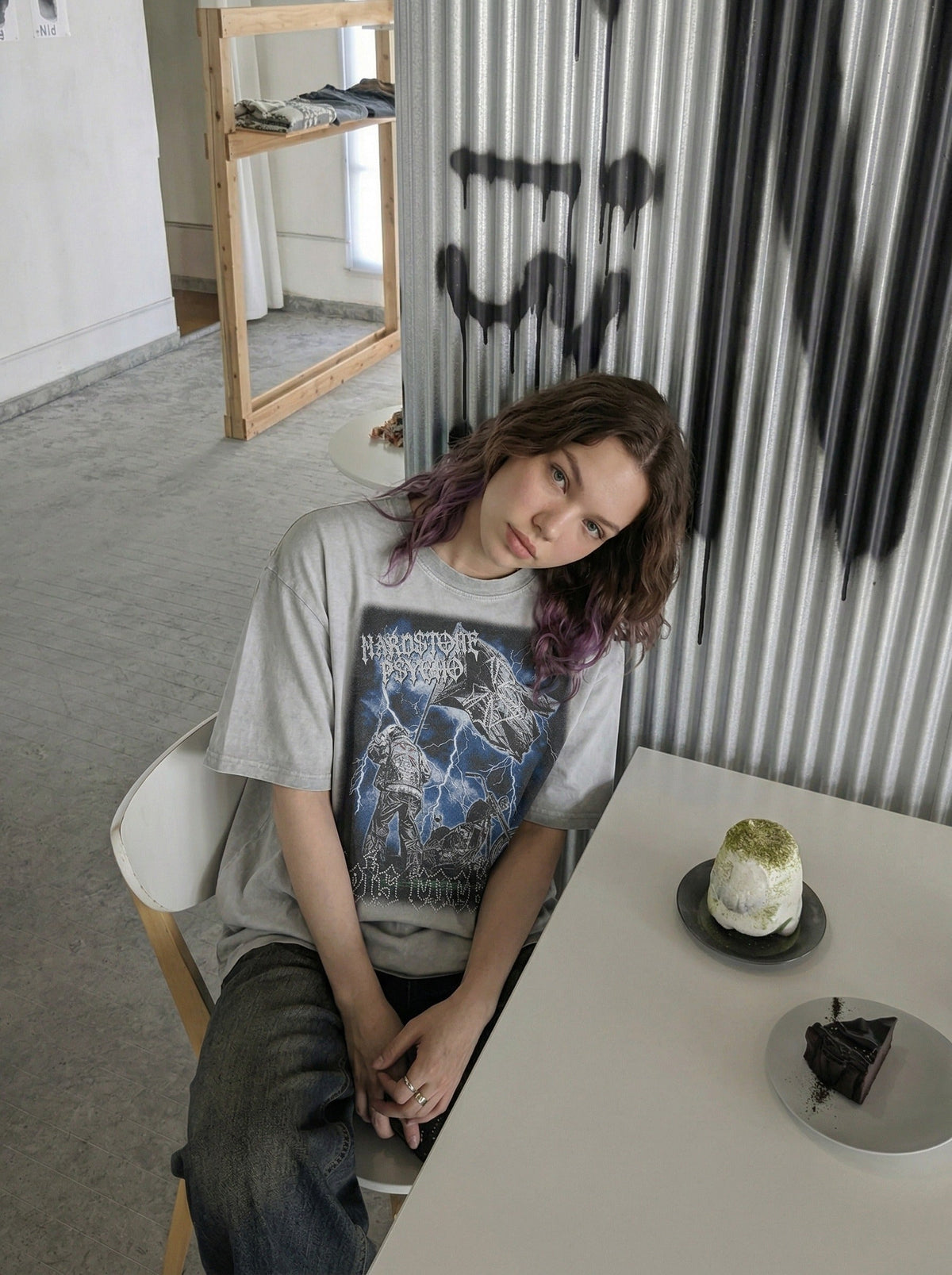 DAXUEN Graphic t-shirt featuring biker illustration and distressed text — model photo