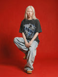 DAXUEN Graphic t-shirt featuring biker illustration and distressed text — model photo