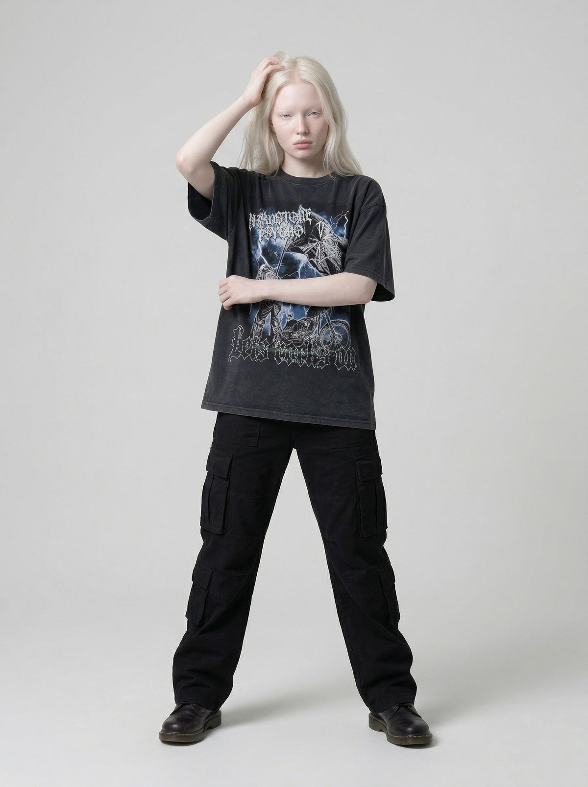 DAXUEN Graphic t-shirt featuring biker illustration and distressed text — model photo