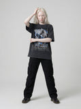 DAXUEN Graphic t-shirt featuring biker illustration and distressed text — model photo