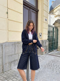 DAXUEN dark indigo denim heart-embroidered cropped shorts — model photo