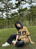 DAXUEN Short-sleeved plaid shirt with embroidery and heart-shaped buttons — model photo