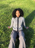DAXUEN heather grey cardigan with black fuzzy trim — model photo