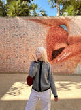 DAXUEN heather grey cardigan with black fuzzy trim — model photo