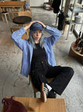 DAXUEN High-waisted black cargo pants with flared legs — model photo