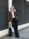 DAXUEN High-waisted black cargo pants with flared legs — model photo
