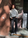 DAXUEN High-waisted black flared denim jeans — model photo