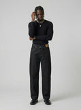 DAXUEN High-waisted black wide-leg jeans — model photo