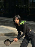 DAXUEN High-waisted black wide-leg jeans — model photo
