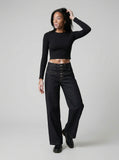 DAXUEN Women's dark indigo high-waisted wide-leg denim jeans — model photo