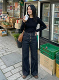 DAXUEN Women's dark indigo high-waisted wide-leg denim jeans — model photo