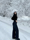 DAXUEN Women's dark indigo high-waisted wide-leg denim jeans — model photo