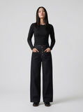 DAXUEN Women's dark indigo high-waisted wide-leg denim jeans — model photo