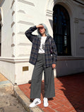 DAXUEN High-waisted wide-leg palazzo pants in dark grey and black — model photo