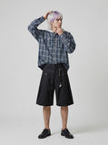 DAXUEN High-waisted wide-leg shorts with pleats and charm — model photo