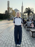 DAXUEN beige high-waisted wide-leg work trousers — model photo