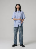 DAXUEN Oversized short-sleeved button-down shirt with stripes — model photo