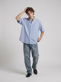 DAXUEN Oversized short-sleeved button-down shirt with stripes — model photo