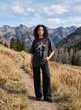 DAXUEN washed-out black oversized humanoid motion graphic tee — model photo