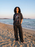 DAXUEN washed-out black oversized humanoid motion graphic tee — model photo