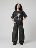 DAXUEN washed-out black oversized humanoid motion graphic tee — model photo